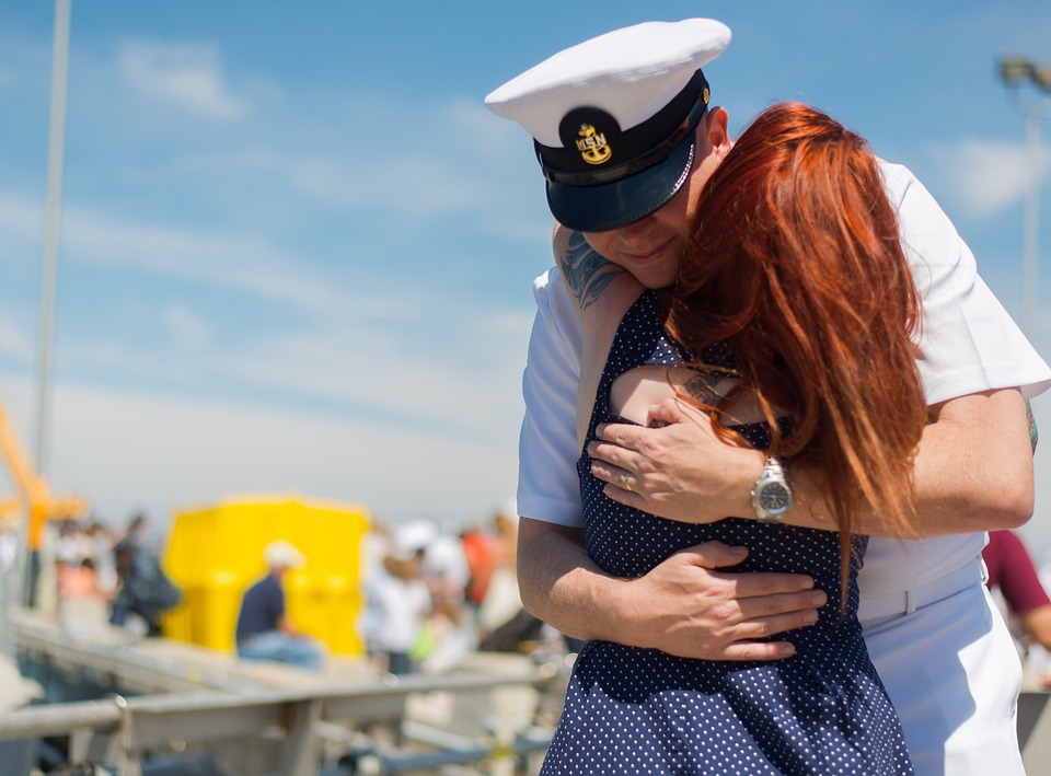 woman hugging a veteran