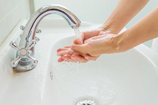 washing-hands-in-a-sink
