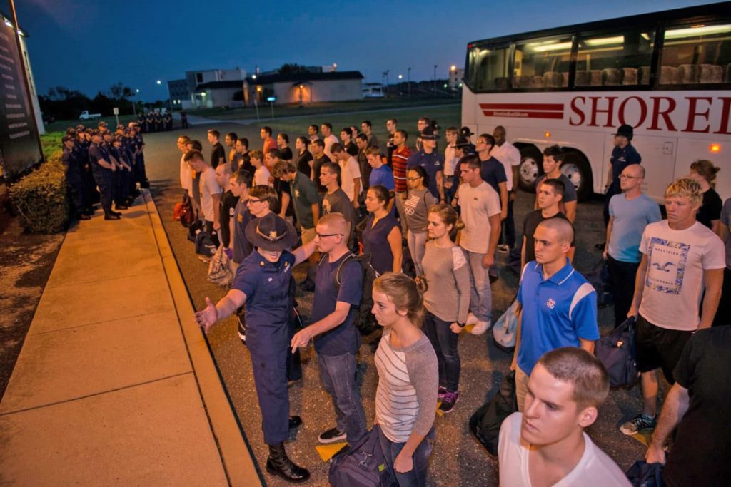 Coast Guard Recruits Stepping off the bus to their first day at boot camp. 