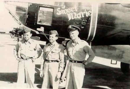 US b-26 Korean soldiers pose in front of their plane