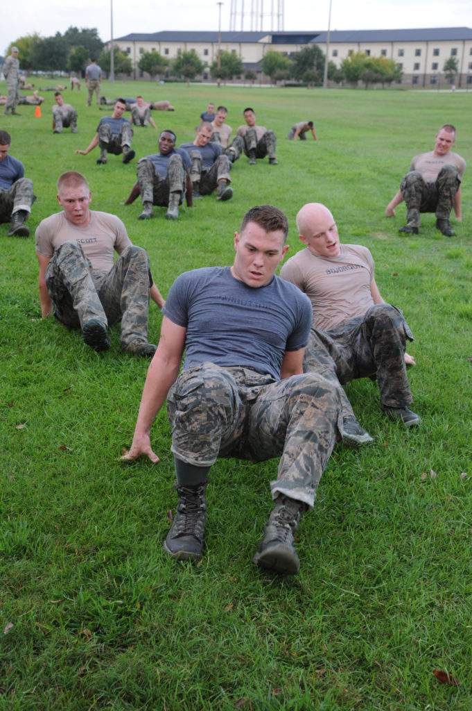 US Military Personnel doing the crab walk in boot camp