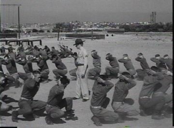 us marine corps recruits do the duck walk exercise during basic training 